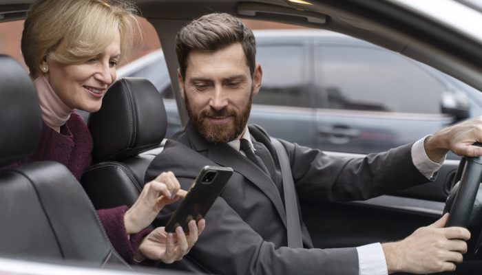 taxi-driver-female-client-interacting-formal-way
